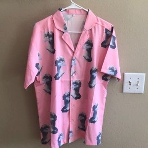 Pastel Pink button up shirt.